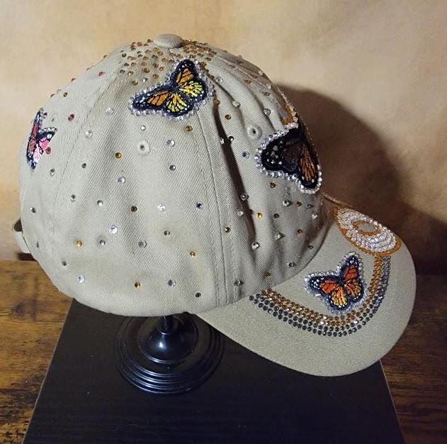 Free Style Rhinestone Tan Unstructured Butterfly Cap Ju-Nel Fashion Boutique
