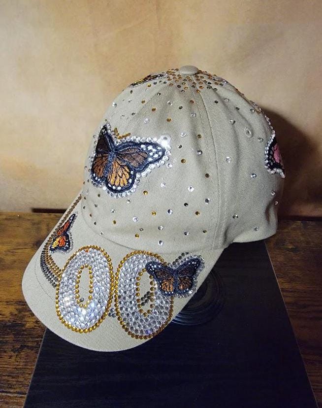 Free Style Rhinestone Tan Unstructured Butterfly Cap Ju-Nel Fashion Boutique