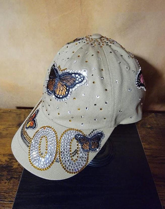 Free Style Rhinestone Tan Unstructured Butterfly Cap Ju-Nel Fashion Boutique
