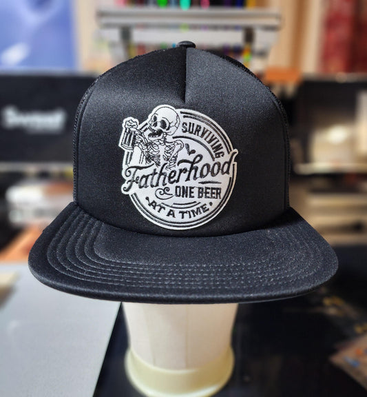 Surviving Fatherhood trucker hat Ju-Nel Fashion Boutique